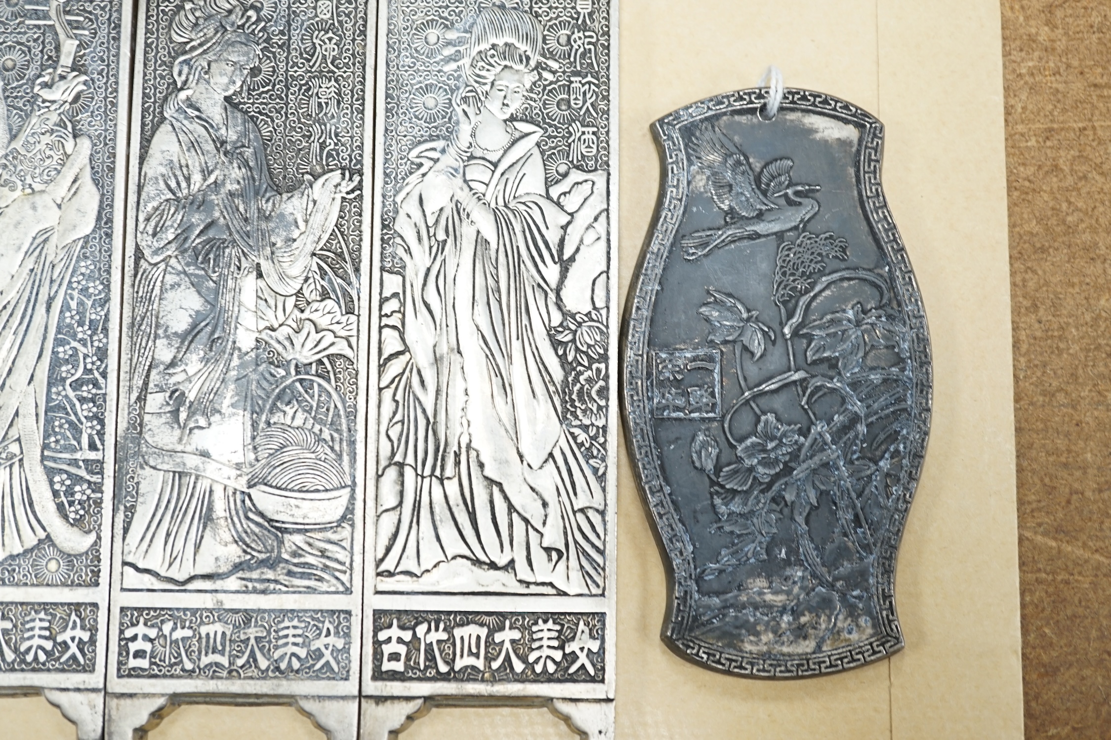 Five Chinese metal embossed figural plaques, four plaques 15cm high. Condition - three tarnished